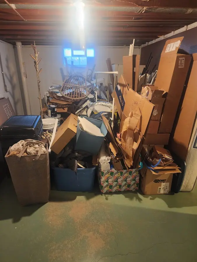 Roll-off dumpster container at job site for 20 Yard Dumpster Rental in Wilson